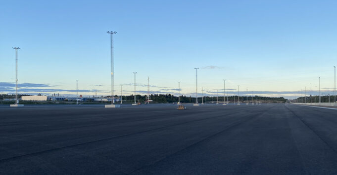 Terminal field with tall light posts.