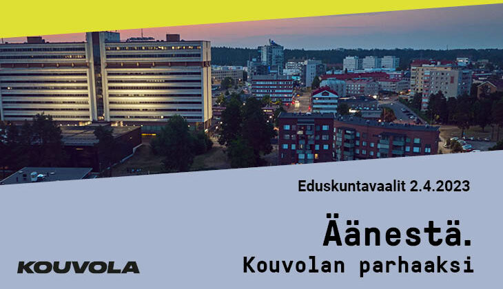 Eduskuntavaalien mainos. Äänestä Kouvolan parhaaksi. Kuvassa Kouvolan keskusta ja Pohjolatalo iltavalaistuksessa.